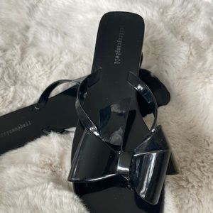 Jeffrey Campbell patent black bow flip flops